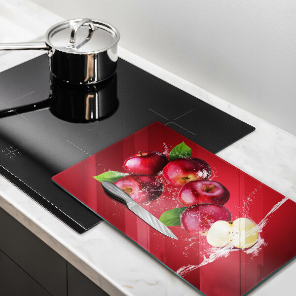 Glass worktop saver Juicy apples in the water
