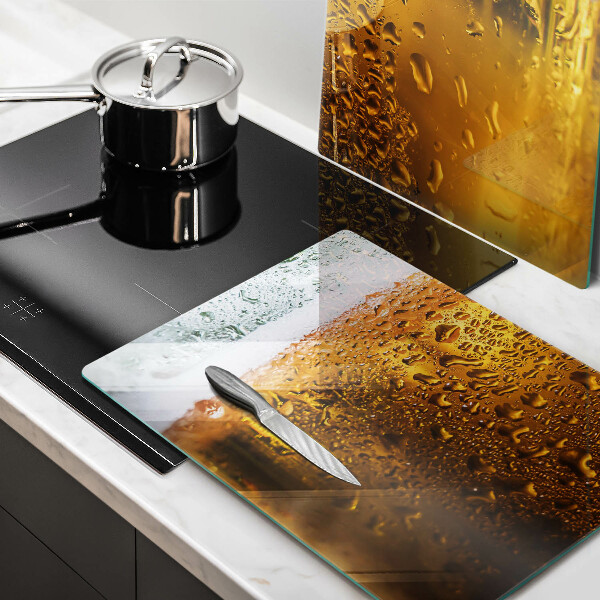 Chopping board Wet glass of beer