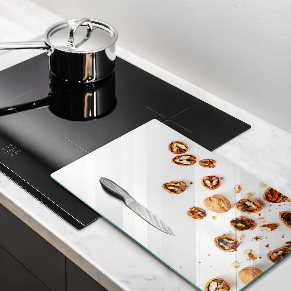 Kitchen chopping board Nuts on a white background