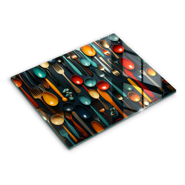 Chopping board Colorful spoons and forks