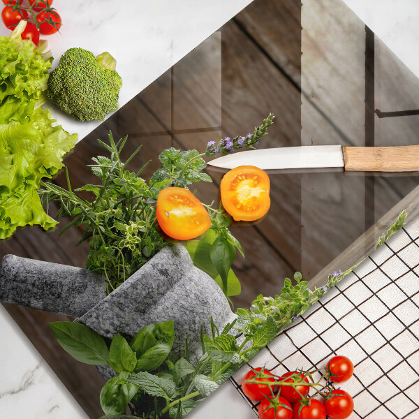 Chopping board glass Herbs plants and wood
