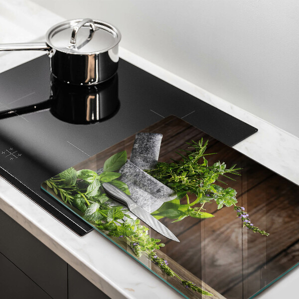 Chopping board glass Herbs plants and wood