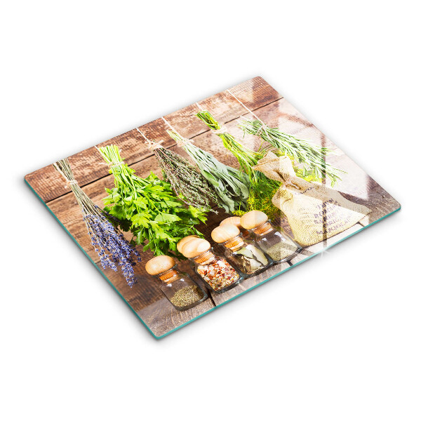 Chopping board glass Herbs spices and wood