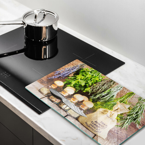 Chopping board glass Herbs spices and wood