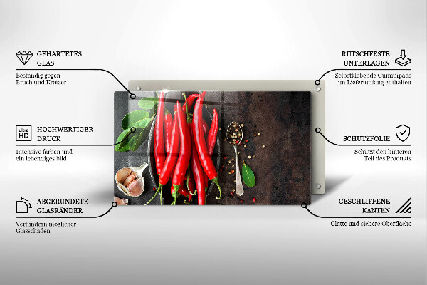 Chopping board glass Red chili peppers
