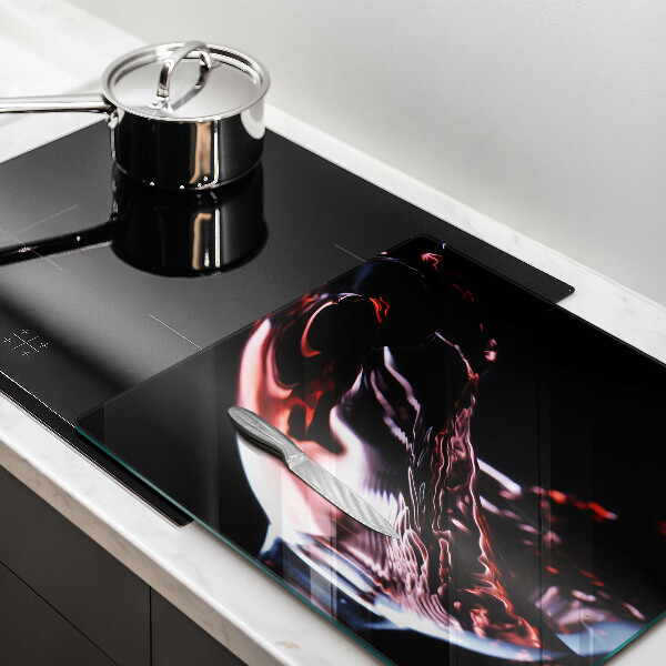 Chopping board A glass of red wine