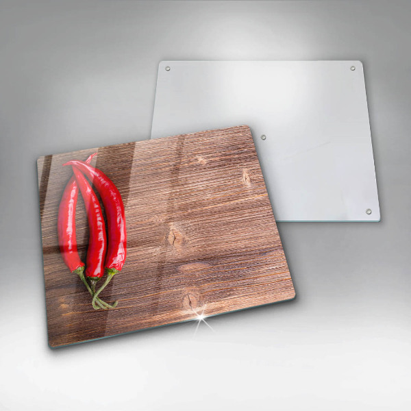 Chopping board Chili peppers on wood