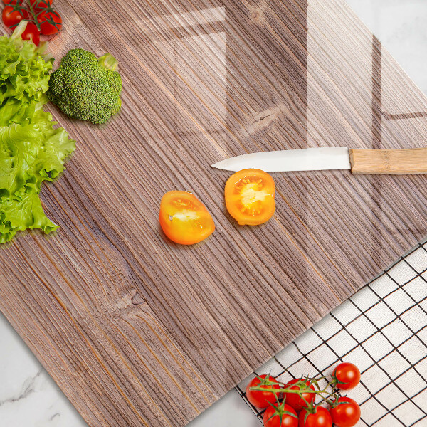 Glass cutting board Chili peppers on wood