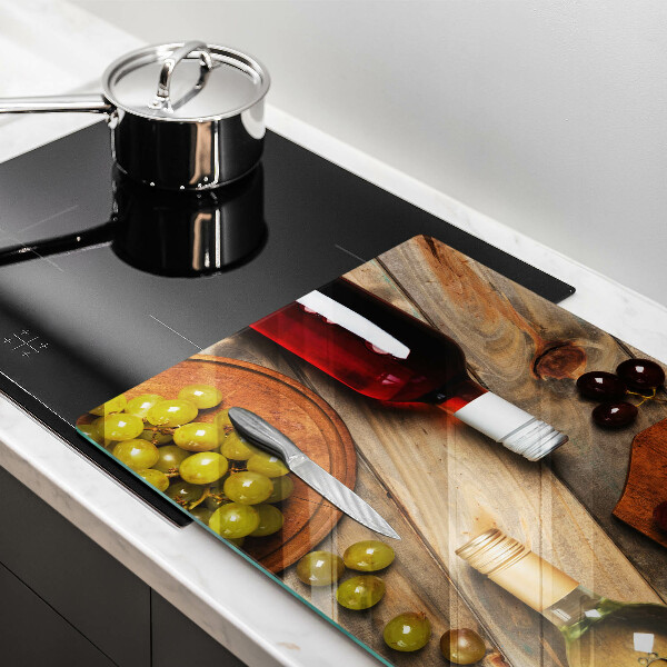 Chopping board glass Bottles of wine and grapes