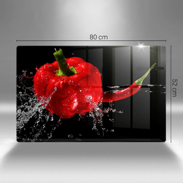 Chopping board glass Red peppers in water