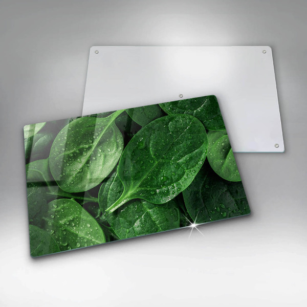 Chopping board glass Basil leaves