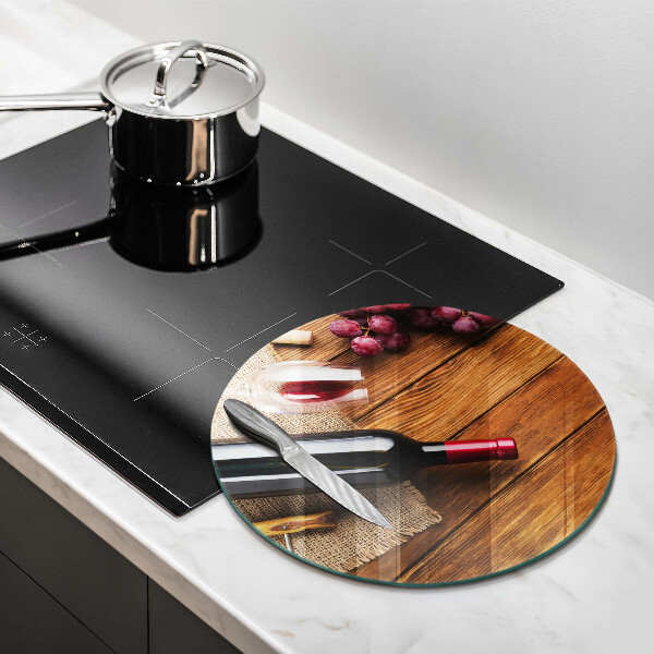 Chopping board glass A bottle of red wine
