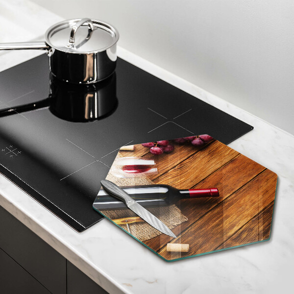 Glass kitchen board A bottle of red wine