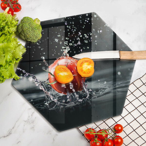 Chopping board glass Tomato in water