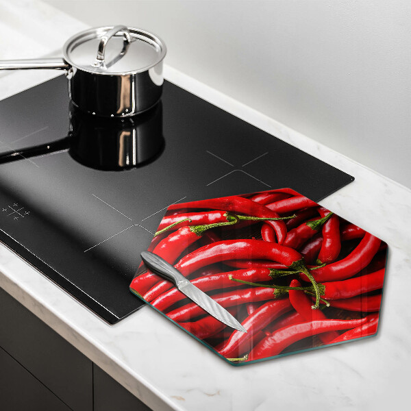 Chopping board glass Hot chili peppers