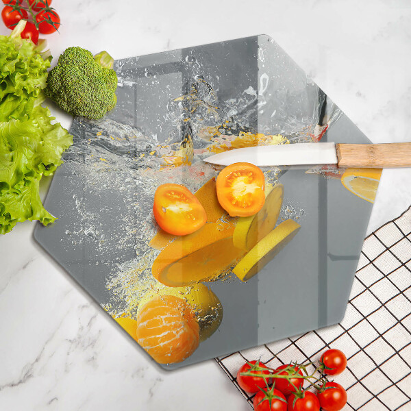 Chopping board glass Lemons in water
