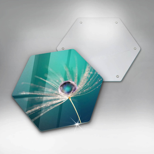 Chopping board glass Dew on a dandelion