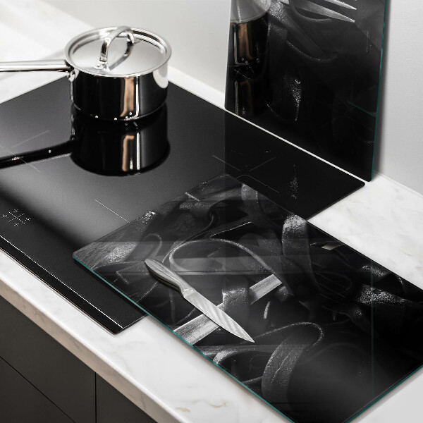 Glass worktop saver Black tagliatelle pasta