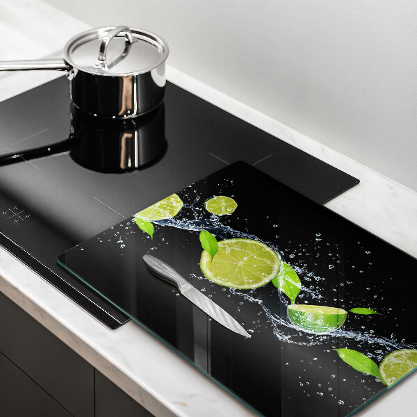 Glass worktop saver Juicy lime in water