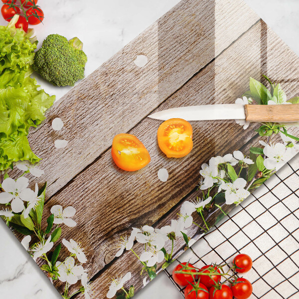Glass worktop saver White flowers on the boards