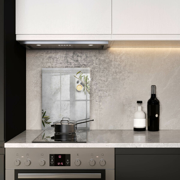 Glass worktop saver Olives on concrete