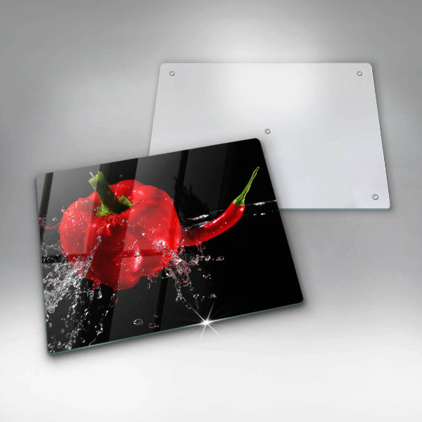 Induction hob protector Red peppers in water