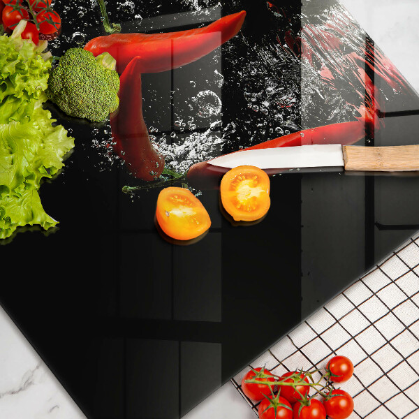 Worktop saver Chili peppers in water