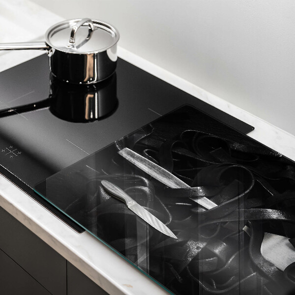 Work surface savers Black tagliatelle pasta