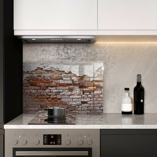 Induction hob cover Old wall of brick and concrete