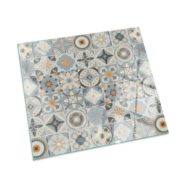 Square glass hearth for log burner Mosaic patterns in tiles