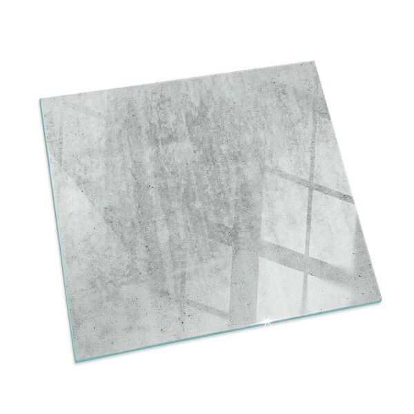 Square glass hearth for log burner Raw concrete texture