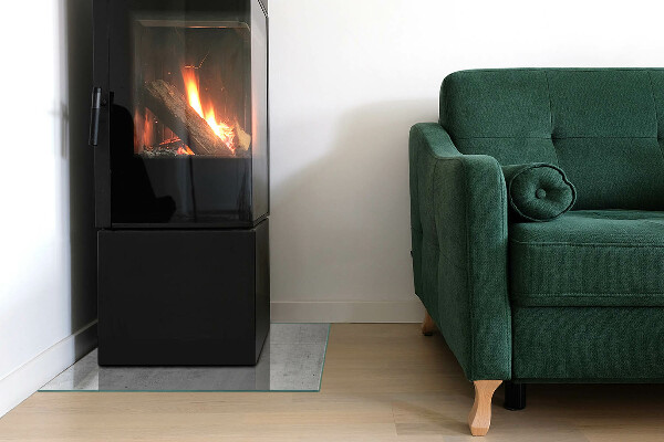 Square glass hearth for log burner Raw concrete texture