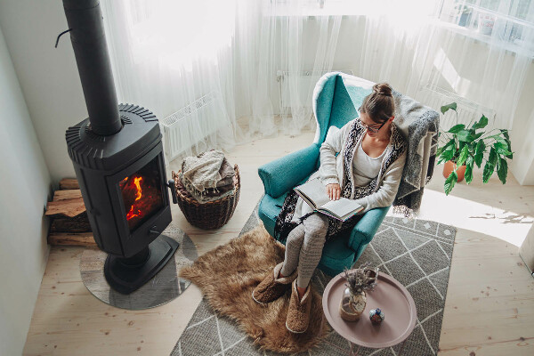 Round glass fire hearth Light wood texture