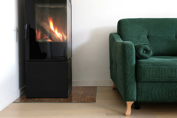 Rectangular glass hearth for log burner Rust texture on metal