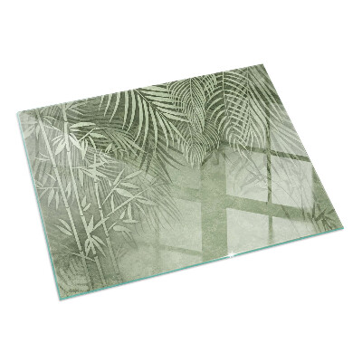 Rectangular glass hearth Tropical leaves in the background