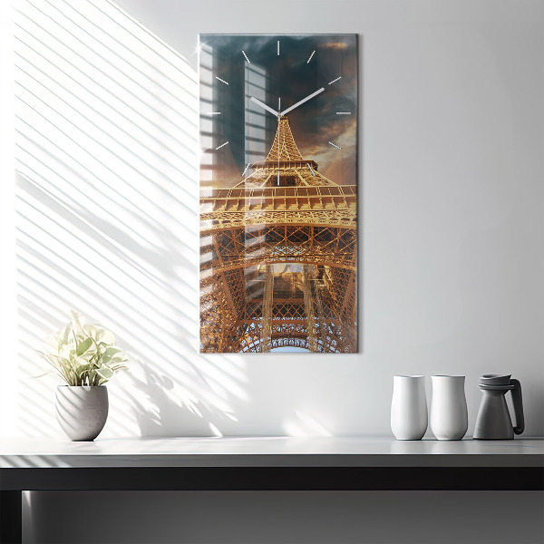 Modern vertical wall clock The Eiffel Tower against the clouds
