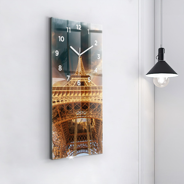 Modern vertical wall clock The Eiffel Tower against the clouds