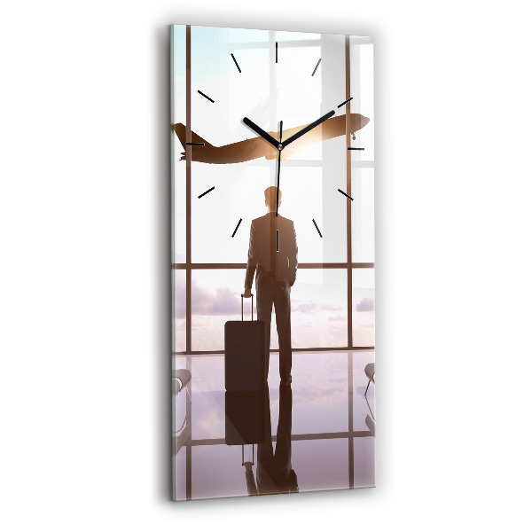 Modern vertical wall clock Man at the airport