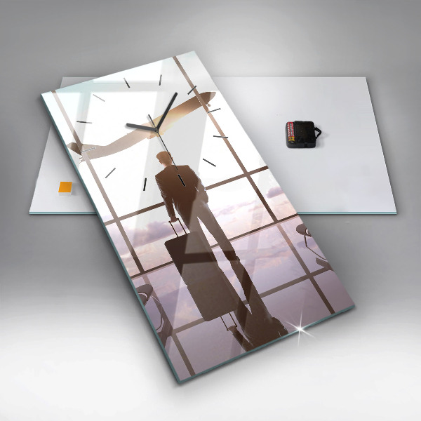 Modern vertical wall clock Man at the airport