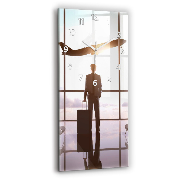 Modern vertical wall clock Man at the airport
