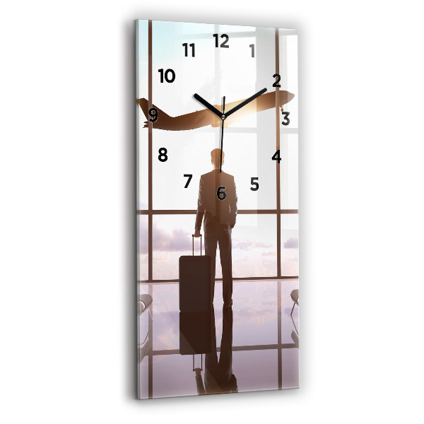 Modern vertical wall clock Man at the airport
