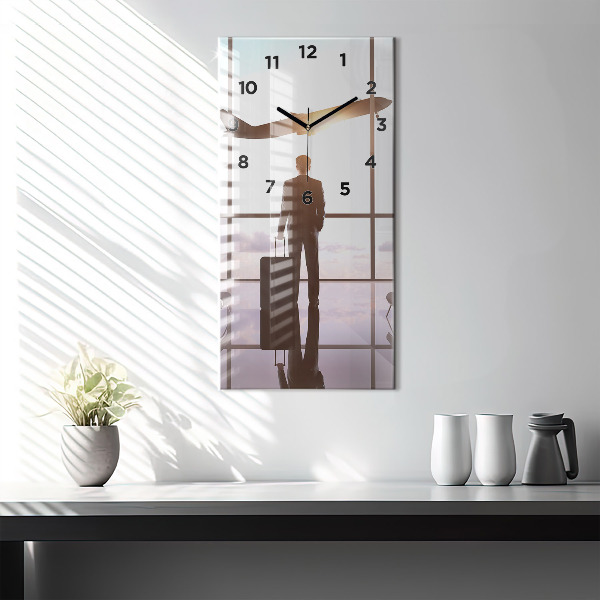 Modern vertical wall clock Man at the airport
