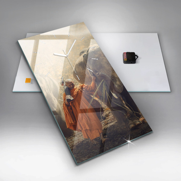 Modern vertical wall clock Monk leading elephants