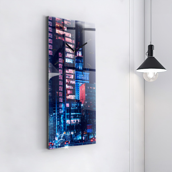 Modern vertical wall clock Warsaw at night