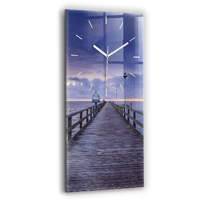 Modern vertical wall clock Pier on the Baltic Sea