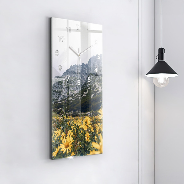 Modern vertical wall clock Meadow flowers in the mountains