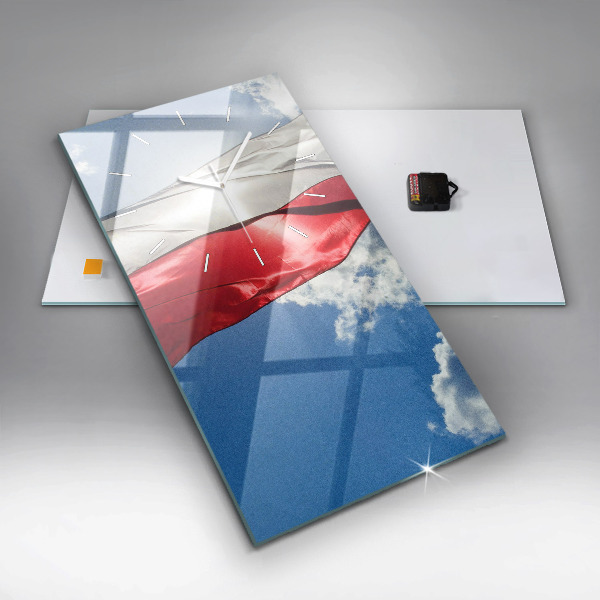 Modern vertical wall clock The Polish flag against the sky