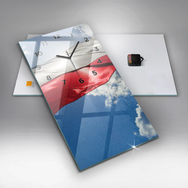 Modern vertical wall clock The Polish flag against the sky