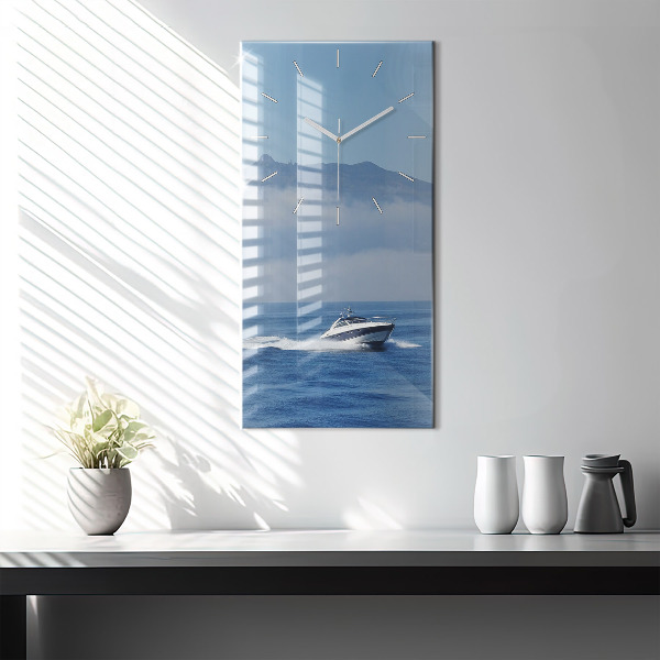 Modern vertical wall clock A boat floating on the ocean