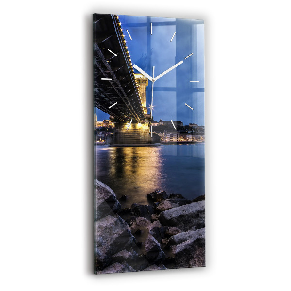Modern vertical wall clock Rocky shore under the bridge